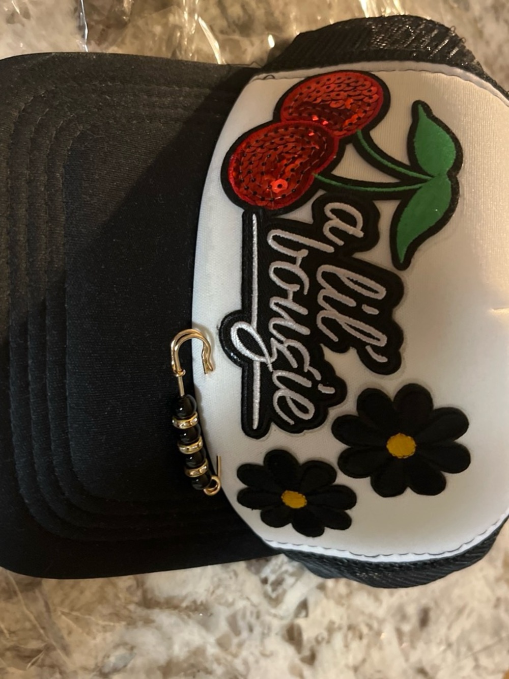 Womens Black and White Trucker Hat with Cherry Patch